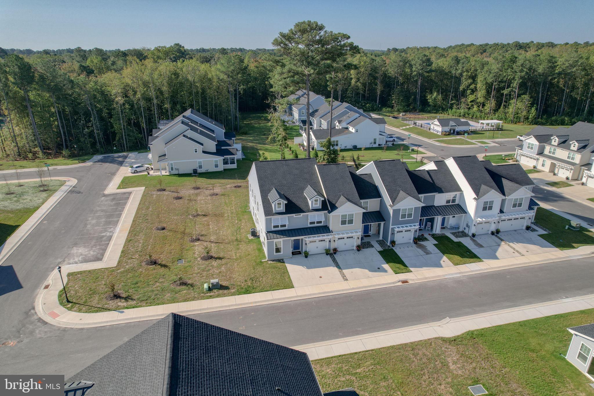 33908 Ardwell Road Frankford, DE 19945 - Photo 4 of 44 an aerial view of a house with a yard basket ball court and outdoor seating