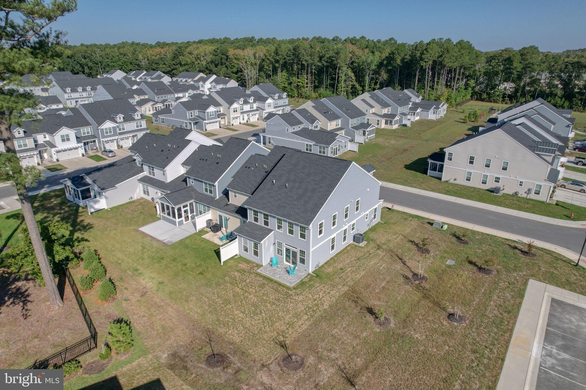 33908 Ardwell Road Frankford, DE 19945 - Photo 5 of 44 an aerial view of a house with a garden