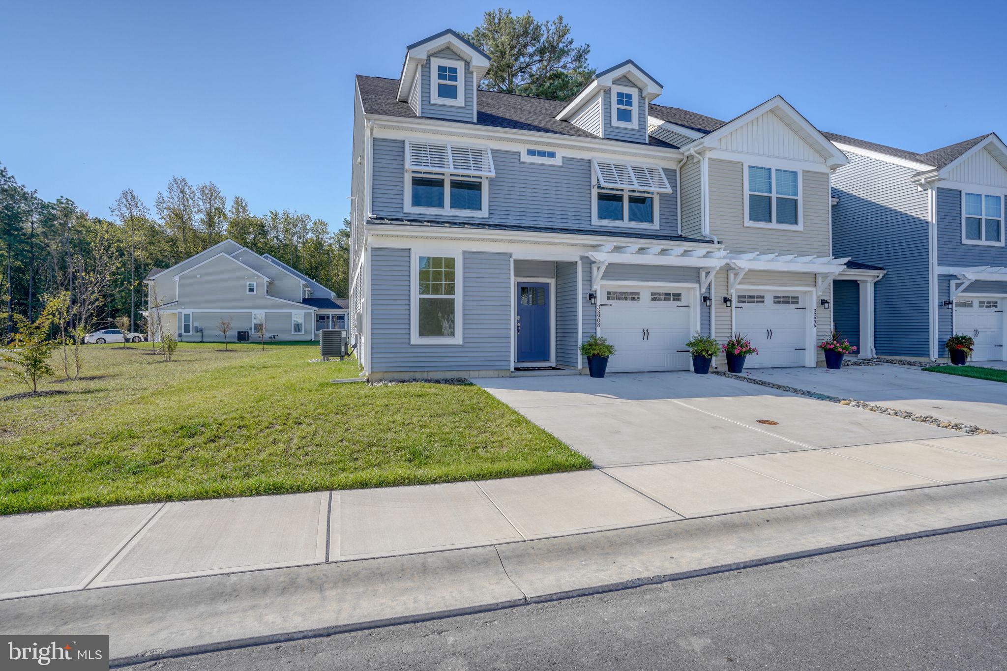 33908 Ardwell Road Frankford, DE 19945 - Photo 7 of 44 a front view of a house with garden