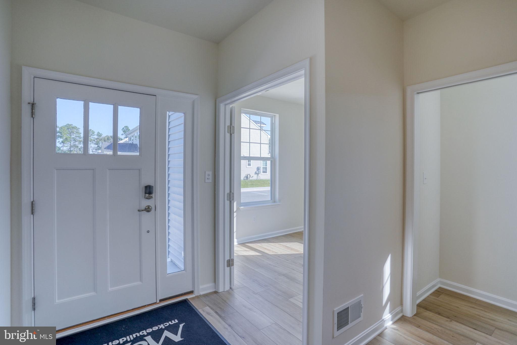 33908 Ardwell Road Frankford, DE 19945 - Photo 9 of 44 a view of an entryway with wooden floor