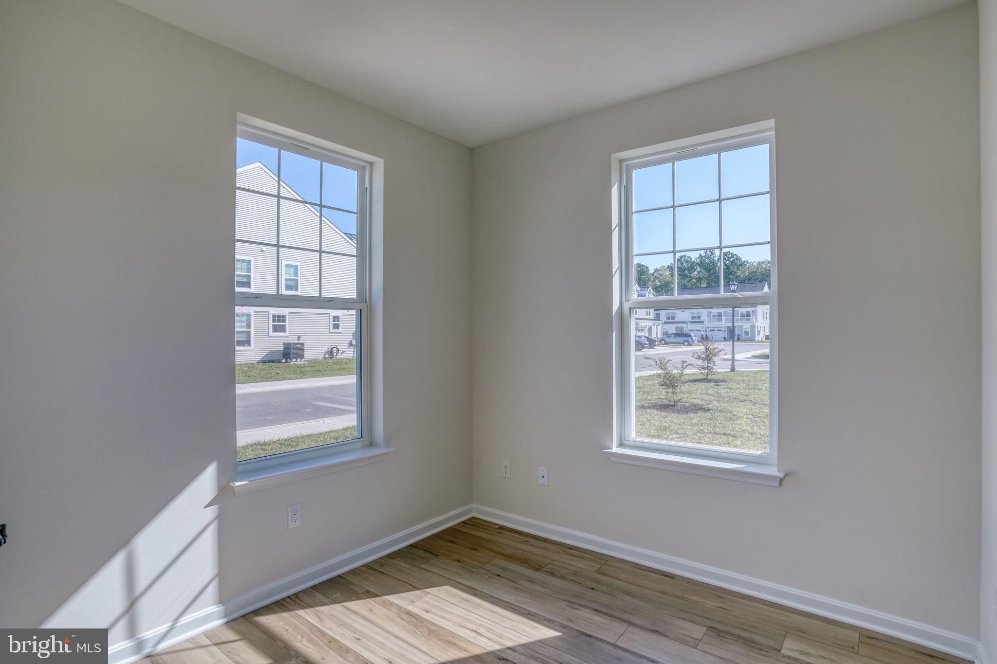 33908 Ardwell Road Frankford, DE 19945 - Photo 10 of 44 a view of an empty room with a window