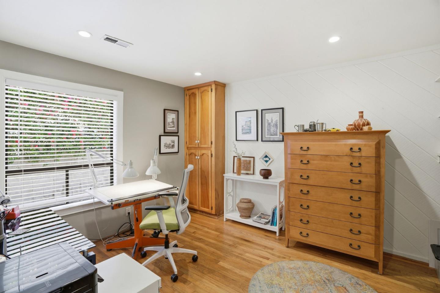 329 Stuart Avenue Pacific Grove, CA 93950 - Photo 19 of 33 a view of a workspace with furniture and a window