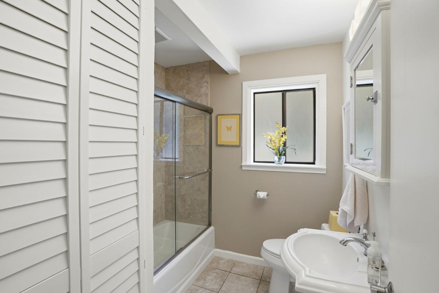 329 Stuart Avenue Pacific Grove, CA 93950 - Photo 20 of 33 a bathroom with a sink and toilet