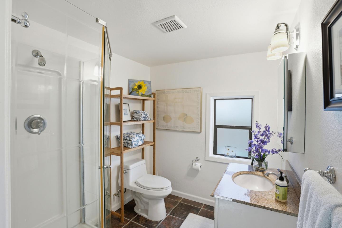 329 Stuart Avenue Pacific Grove, CA 93950 - Photo 22 of 33 a bathroom with a sink toilet and shower