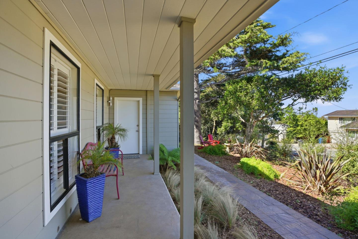 329 Stuart Avenue Pacific Grove, CA 93950 - Photo 23 of 33 a view of a potted flower in a yard