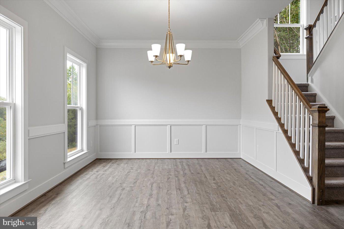 1 Indiantown Road King George, VA 22485 - Photo 9 of 43 Formal Dining Room w/ Chandelier + Crown Molding