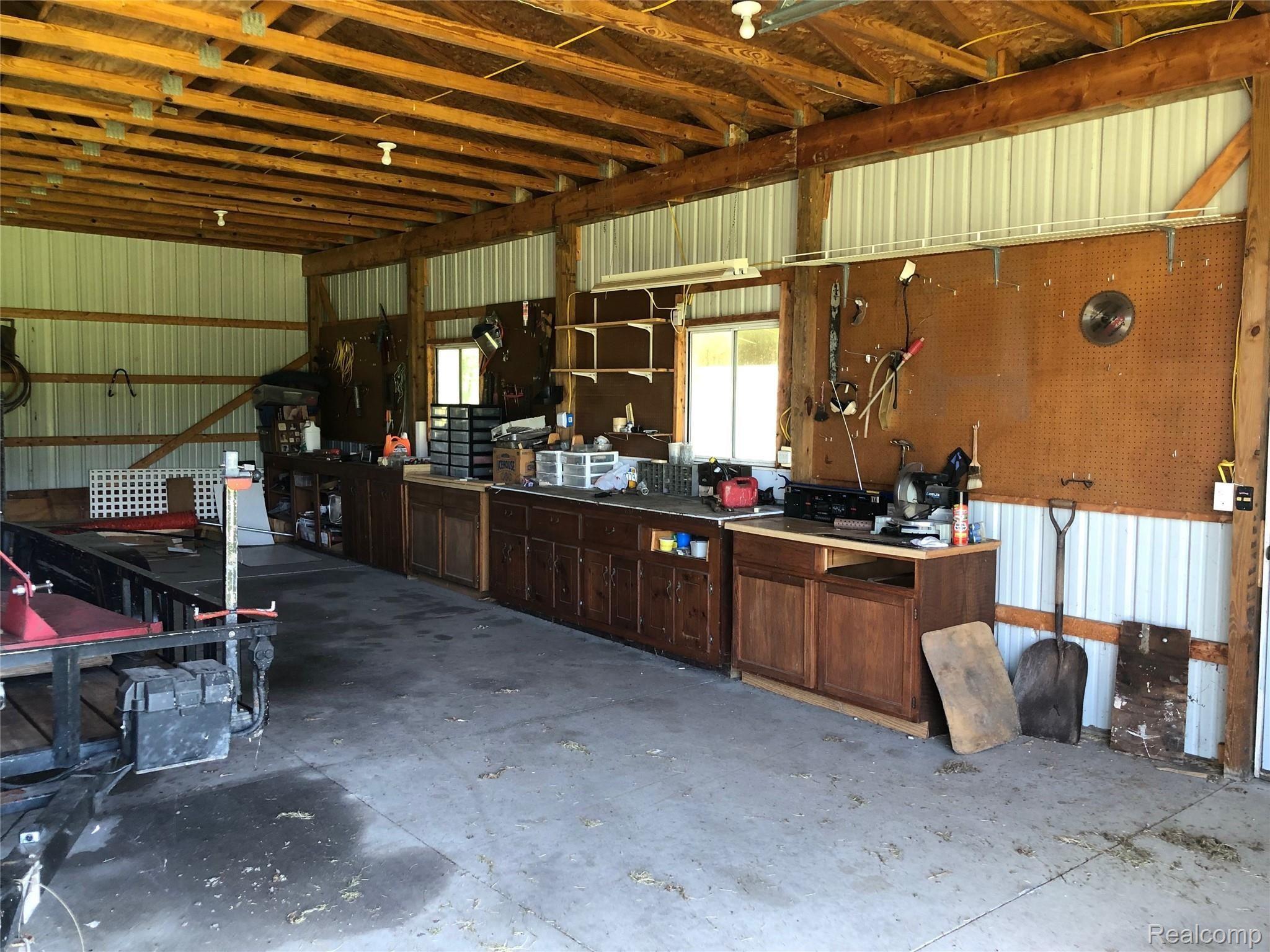 3663 Kilgore Road Avoca, MI 48006 - Photo 41 of 57 Pole barn has many different storage areas and work tops
