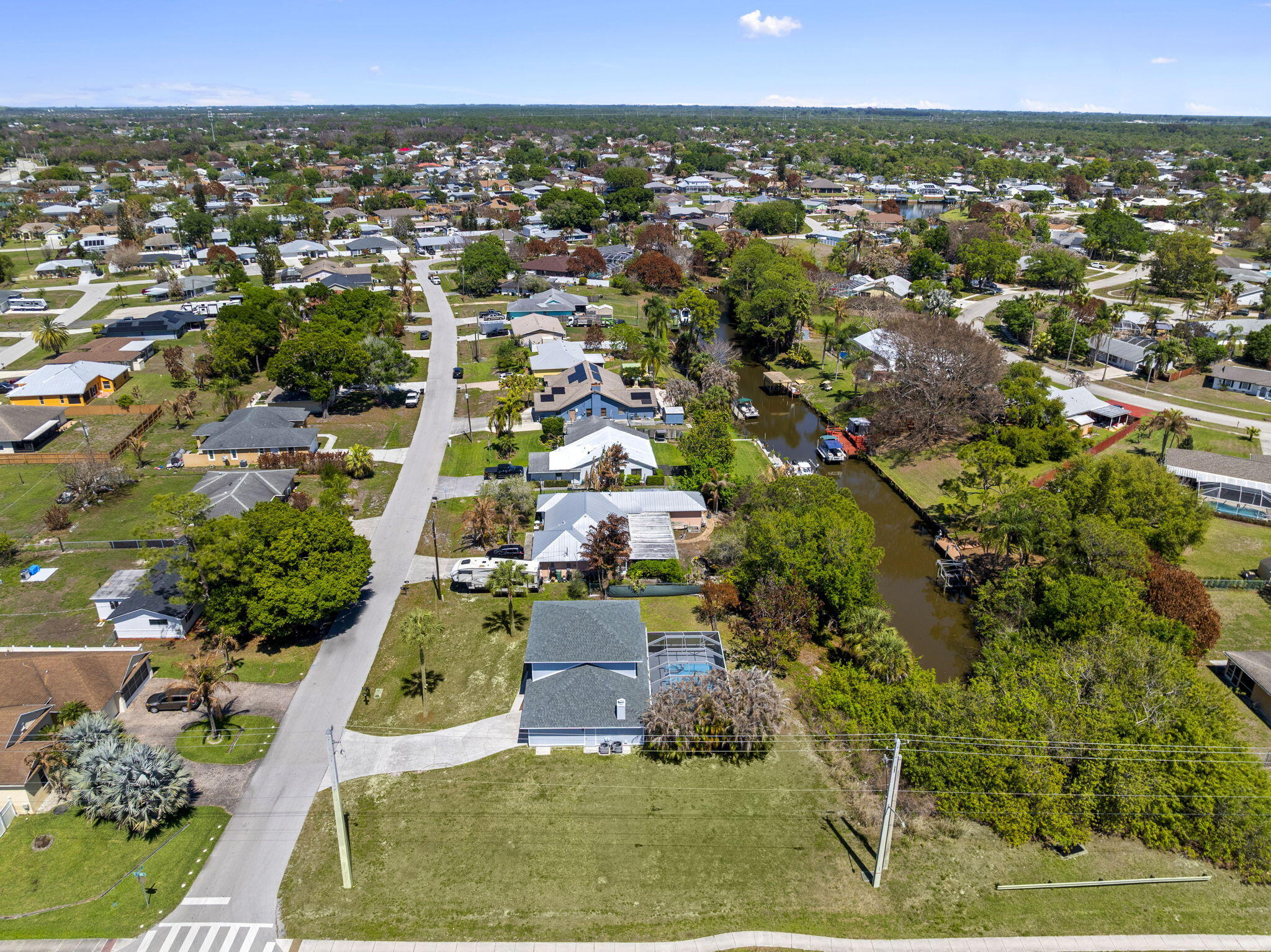 405 Northeast Midvale Street Port St. Lucie, FL 34983 - Photo 57 of 60 Sideyard St. Lucie River Drone Shot