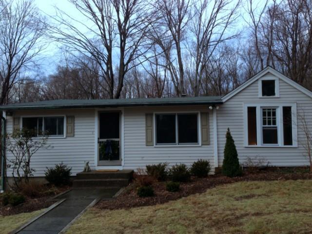 34 Southbury Road Roxbury, CT 06783 - Photo 1 of 1 a front view of a house with garden