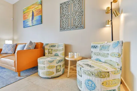 a living room with a couch and a table