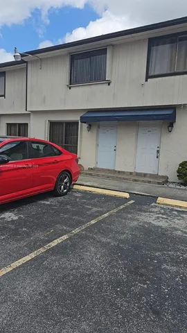a front view of a house with a garage