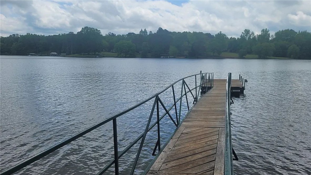 303 Lookover Drive Anderson, SC 29621 - Photo 46 of 46 This serene waterfront retreat offers a private pier, perfect for enjoying the tranquil lake.