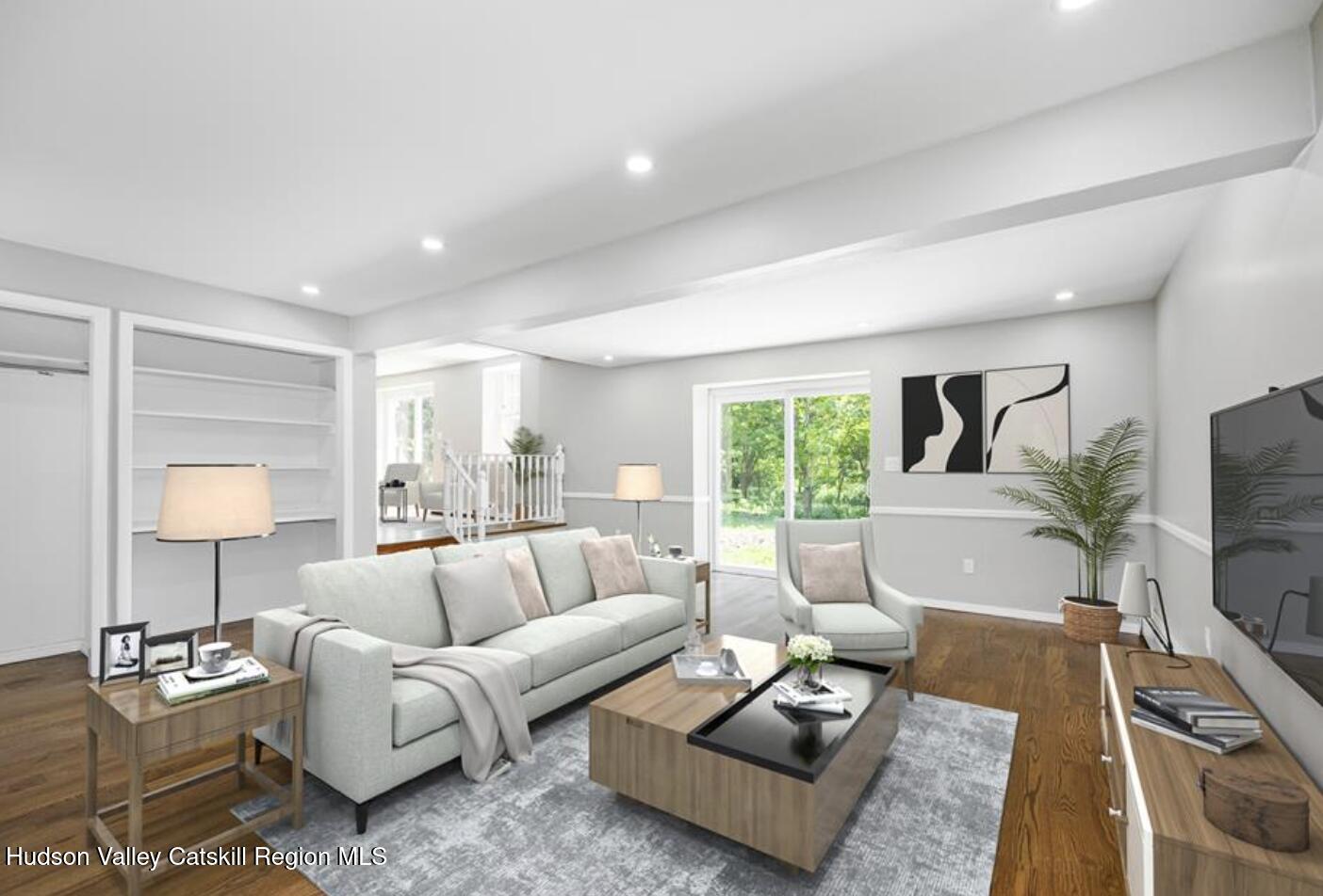 12 State Line Road Millerton, NY 12546 - Photo 5 of 11 a living room with furniture flat screen tv and a large window