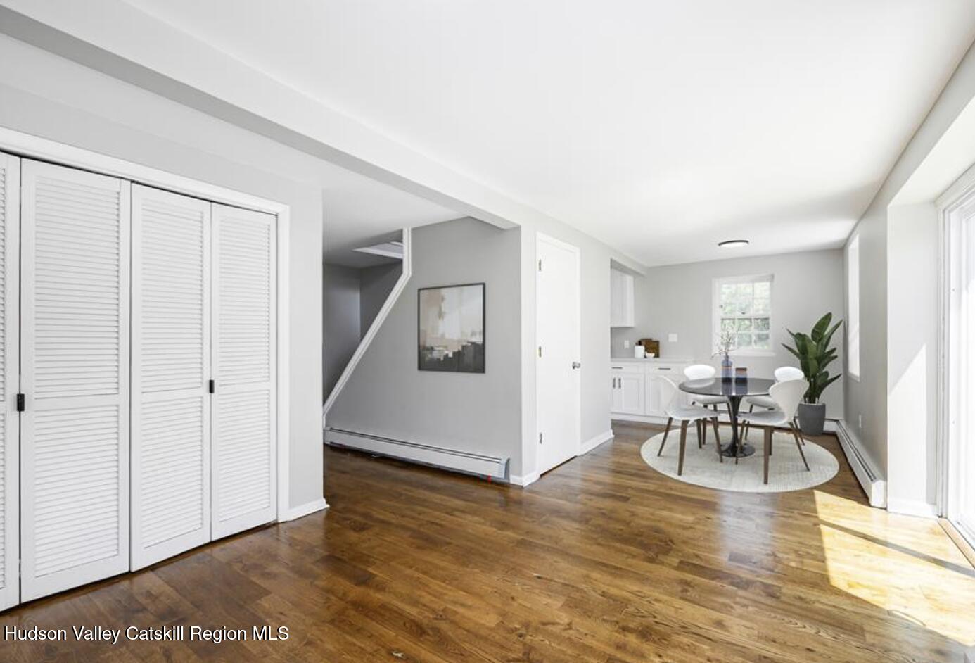 12 State Line Road Millerton, NY 12546 - Photo 6 of 11 a living room with furniture and a wooden floor