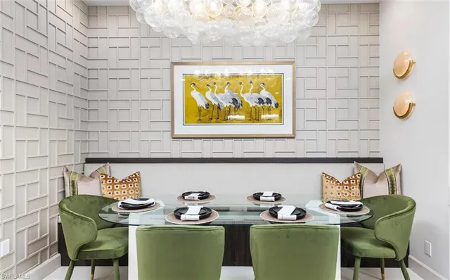 a kitchen with cabinets a center island and appliances