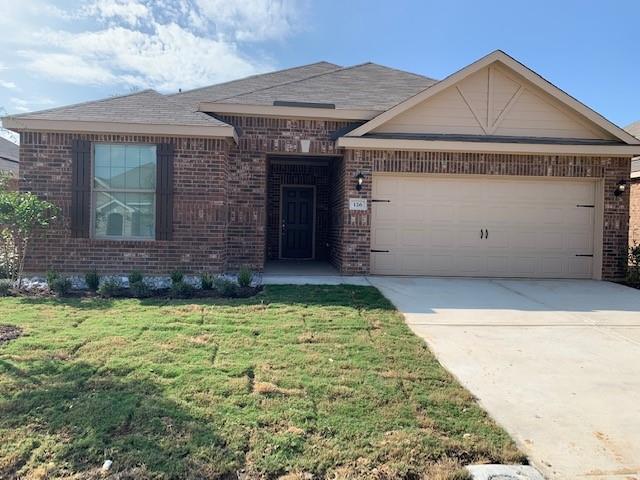 135 Morning Glory Sanger, TX 76266 - Photo 1 of 9 a front view of a house with garden