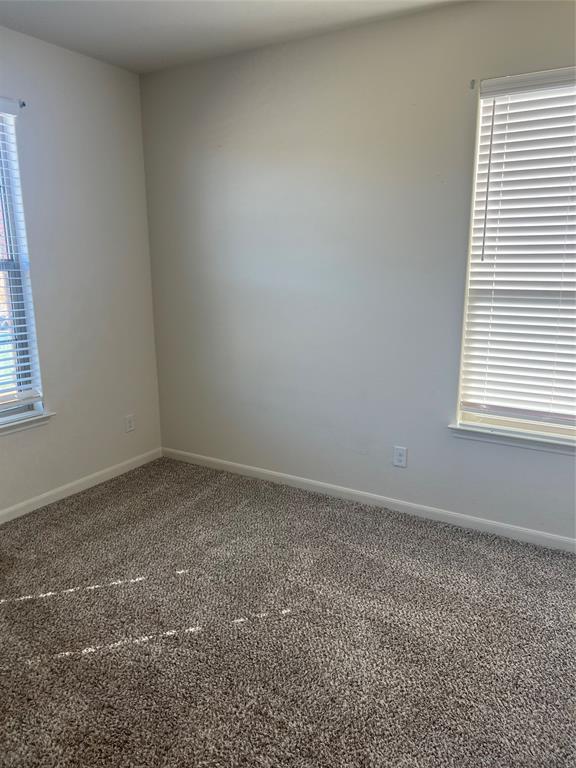 135 Morning Glory Sanger, TX 76266 - Photo 8 of 9 an empty room with a window