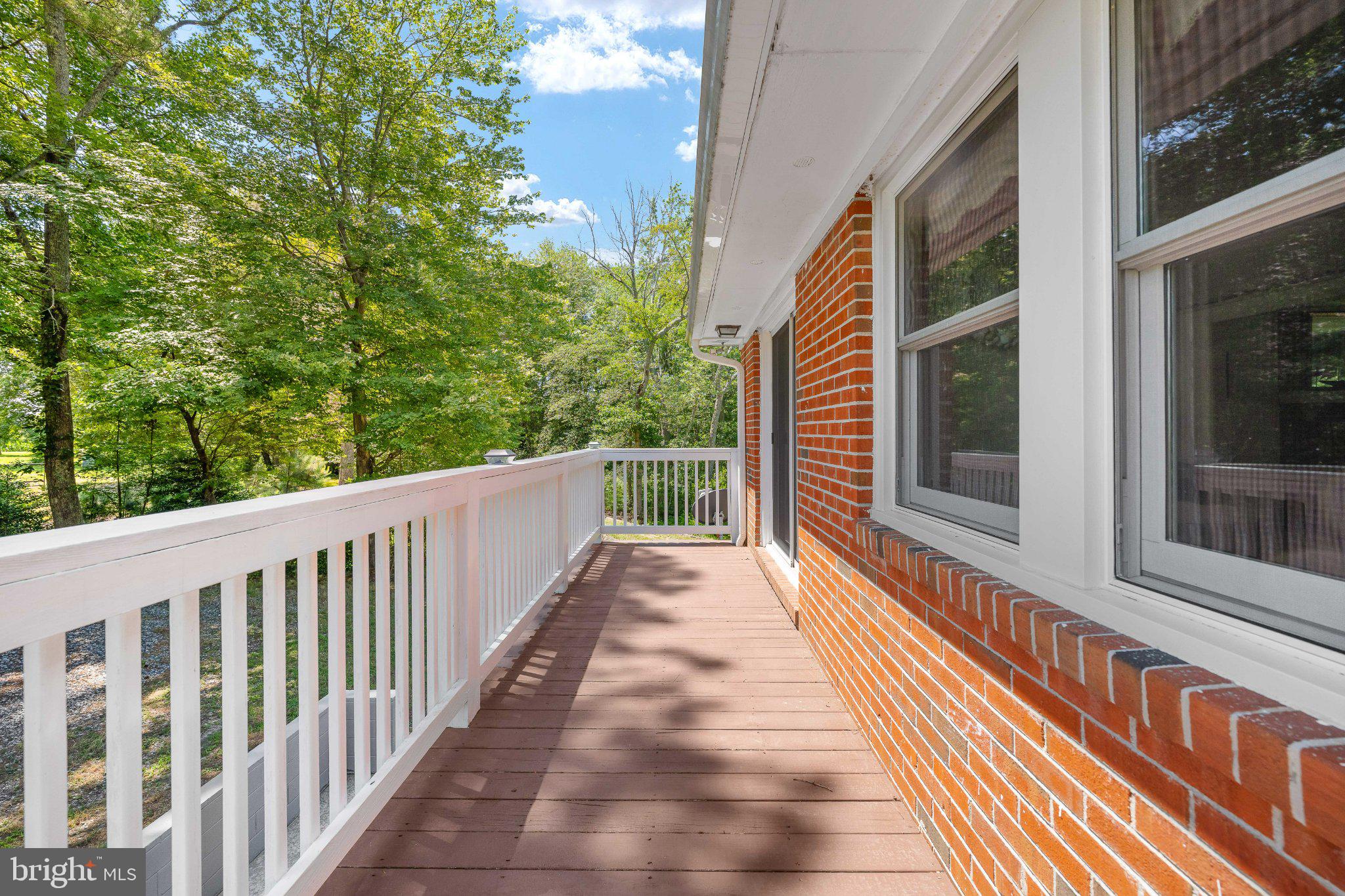 279 Harbor Drive Reedville, VA 22539 - Photo 11 of 97 Balcony off the kitchen and dining room