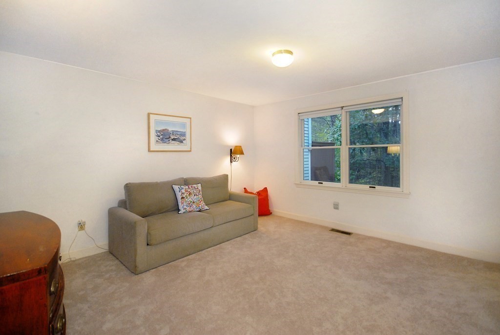 6 Winterberry Path, Unit 6 Acton, MA 01720 - Photo 7 of 24 a living room with furniture and window