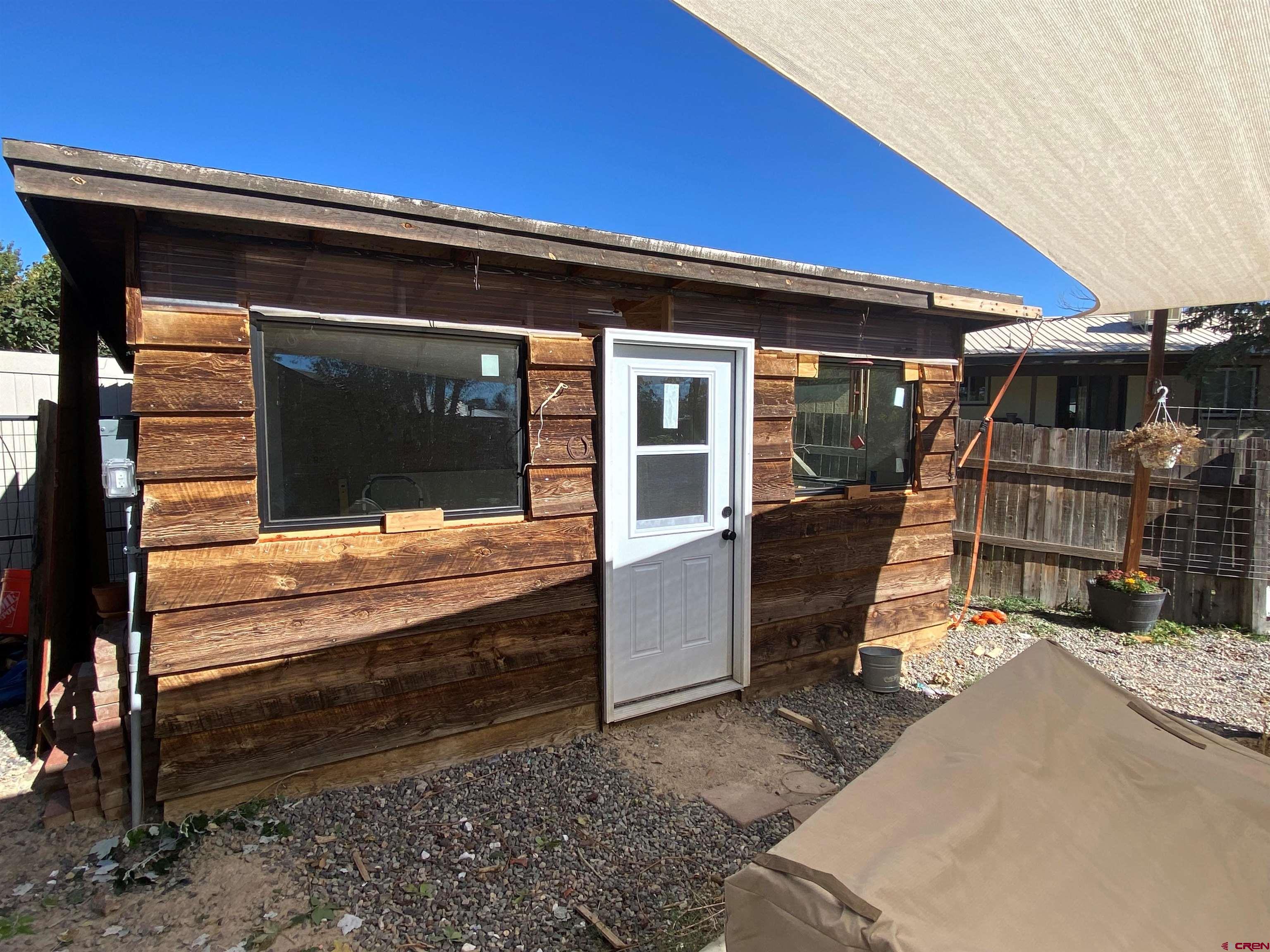1861 Ouray Drive Montrose, CO 81401 - Photo 11 of 13 a view of swimming pool with outdoor seating