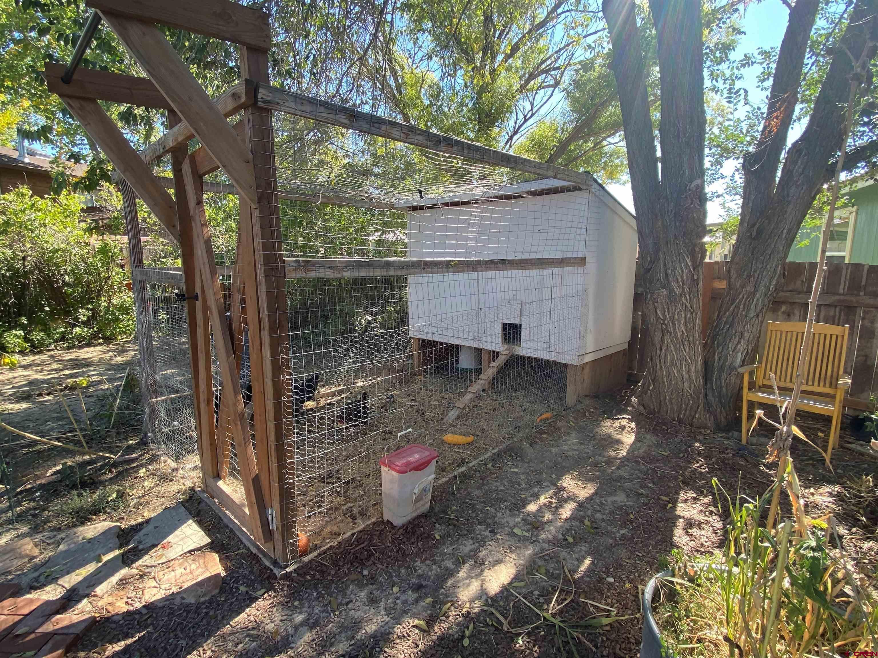 1861 Ouray Drive Montrose, CO 81401 - Photo 13 of 13 a view of a backyard with a tree