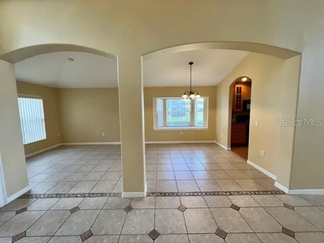 a gym room with lots of gym equipment