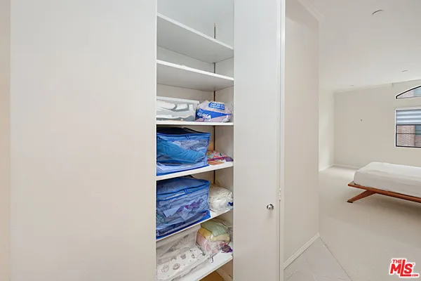 a room with storage and utility