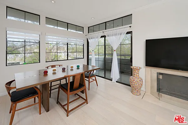 a room with a bed and window