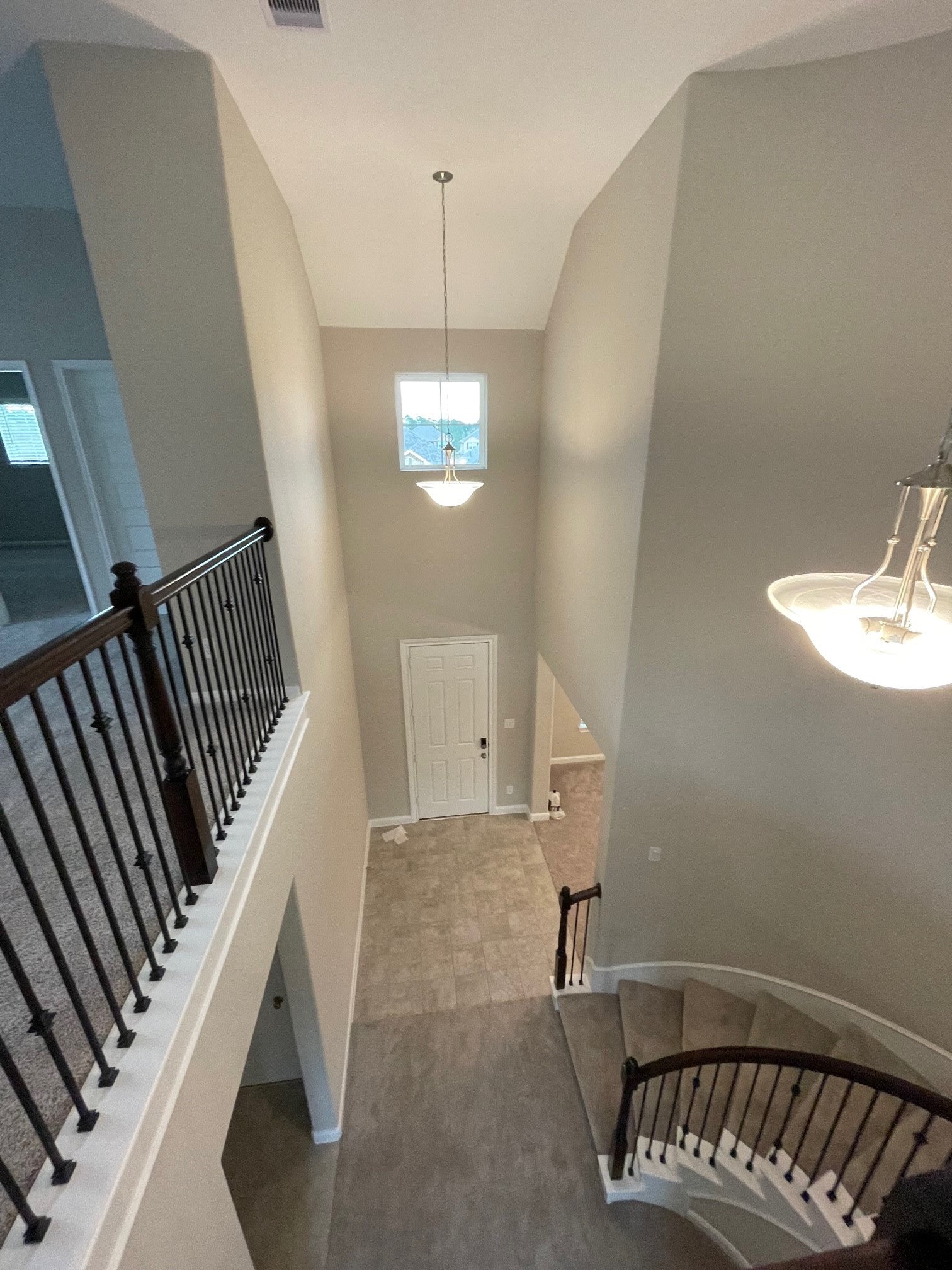 2216 Gadwall Court Conroe, TX 77384 - Photo 14 of 23 a view of an entryway wooden floor and staircase