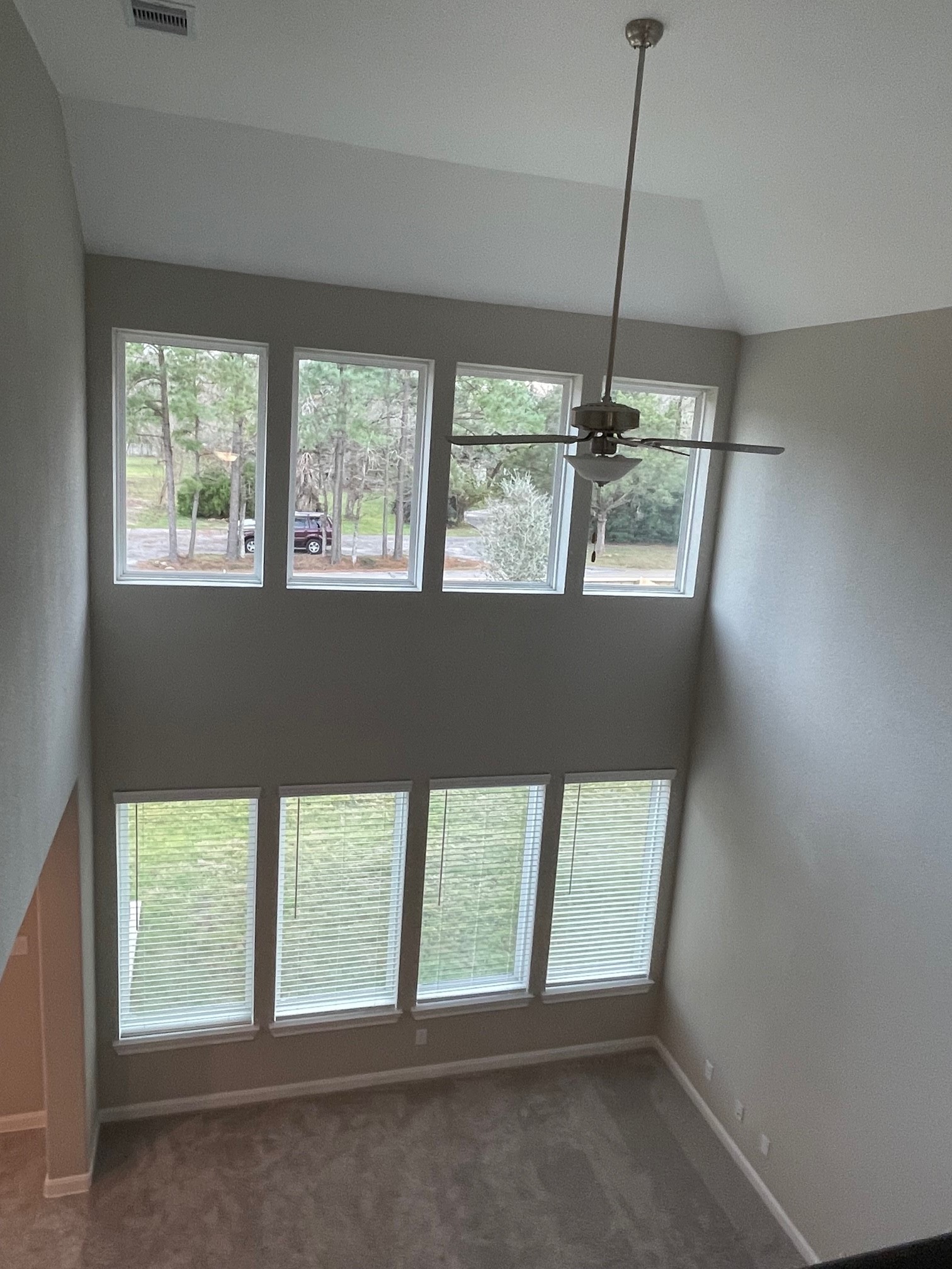 2216 Gadwall Court Conroe, TX 77384 - Photo 18 of 23 a view of an empty room with a window