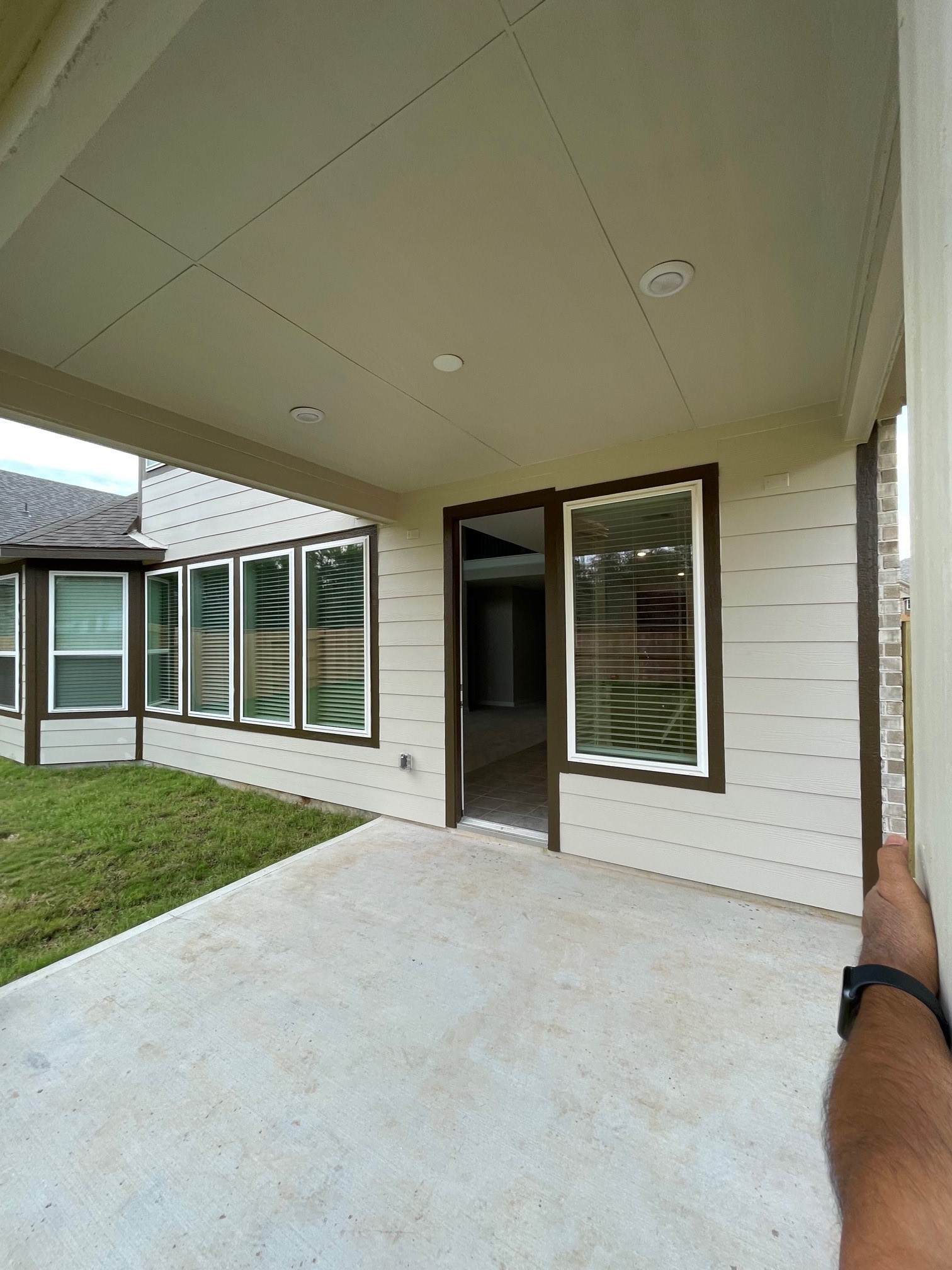 2216 Gadwall Court Conroe, TX 77384 - Photo 23 of 23 a view of a house with a yard and large window