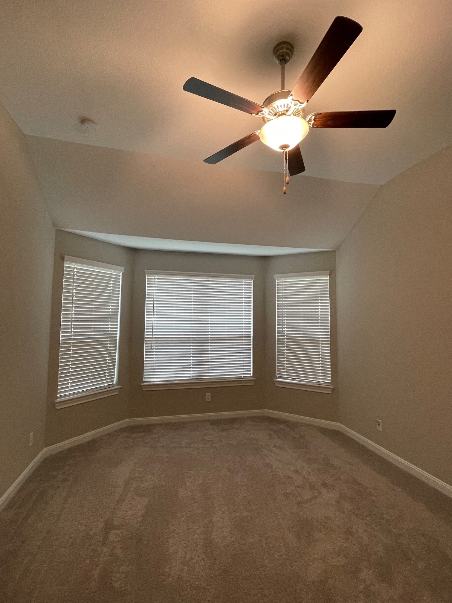 2216 Gadwall Court Conroe, TX 77384 - Photo 8 of 23 a view of an empty room with a window