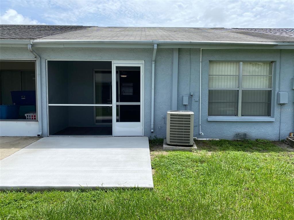 2853 Stillwell Court New Port Richey, FL 34655 - Photo 15 of 15 a front view of a house with a yard