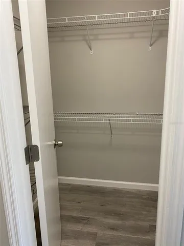 a view of a room with racks on the wall