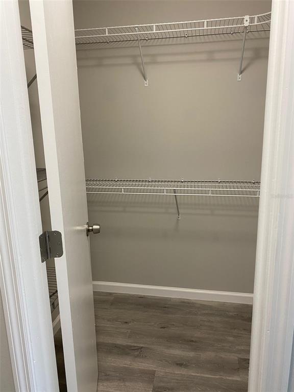 2853 Stillwell Court New Port Richey, FL 34655 - Photo 8 of 15 a view of a room with racks on the wall