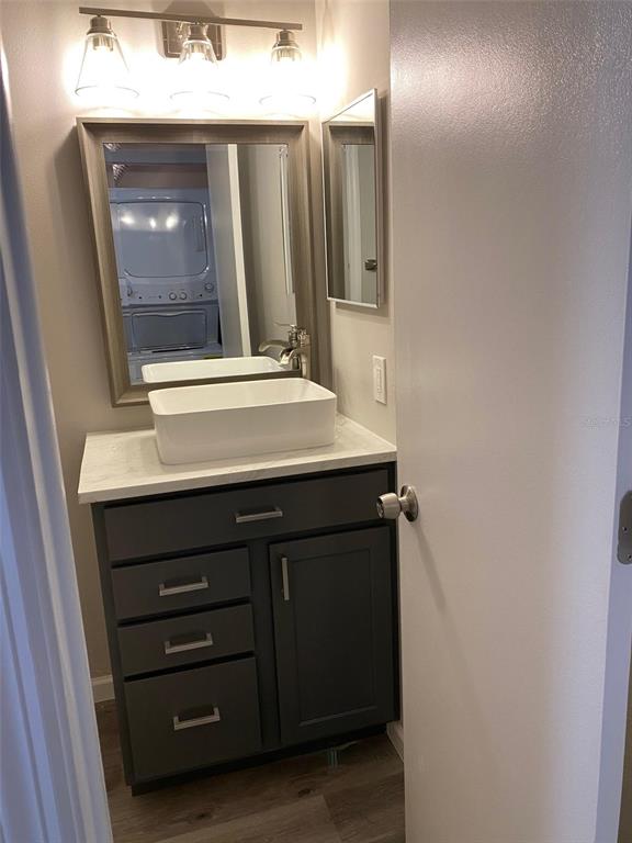 2853 Stillwell Court New Port Richey, FL 34655 - Photo 10 of 15 a bathroom with a sink a vanity and a mirror