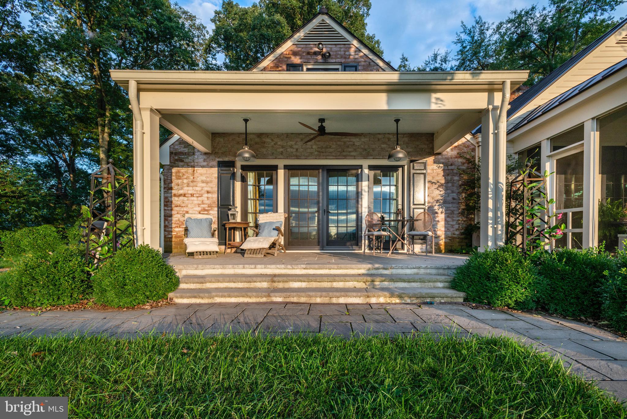 9474 Foxville Road Warrenton, VA 20186 - Photo 24 of 42 Primary Bedroom Stone Terrace. Lighting and Fan