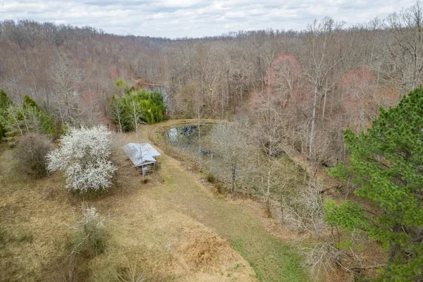 a view of a yard from a balcony