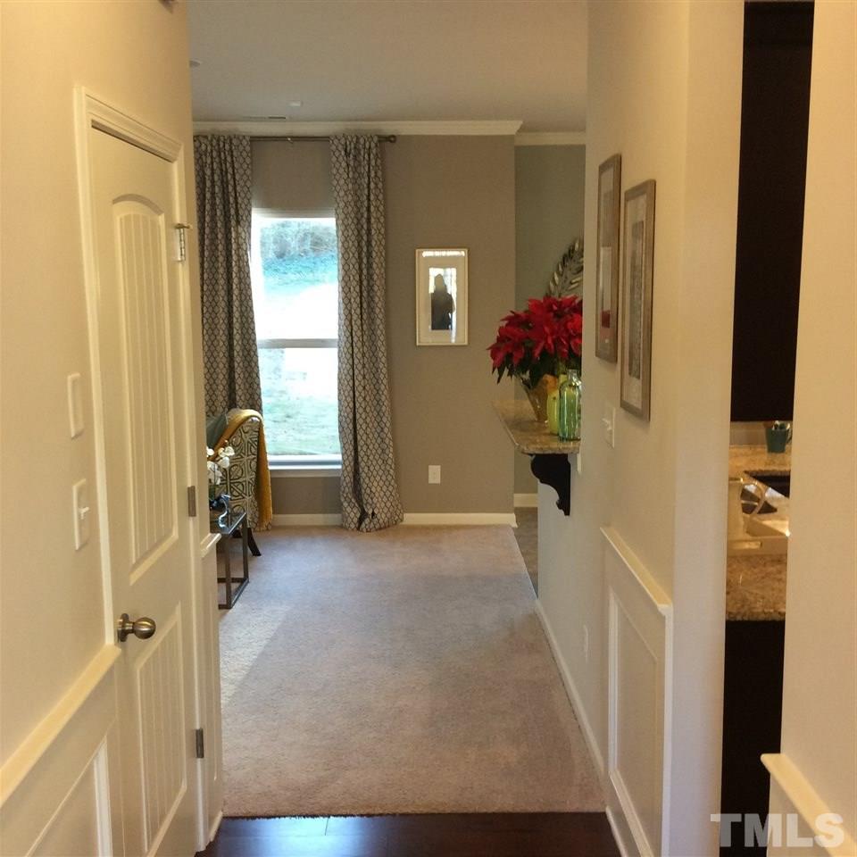 3706 Burtons Barn Street, Unit 2 Raleigh, NC 27610 - Photo 3 of 7 a view of hallway with livingroom and stairs