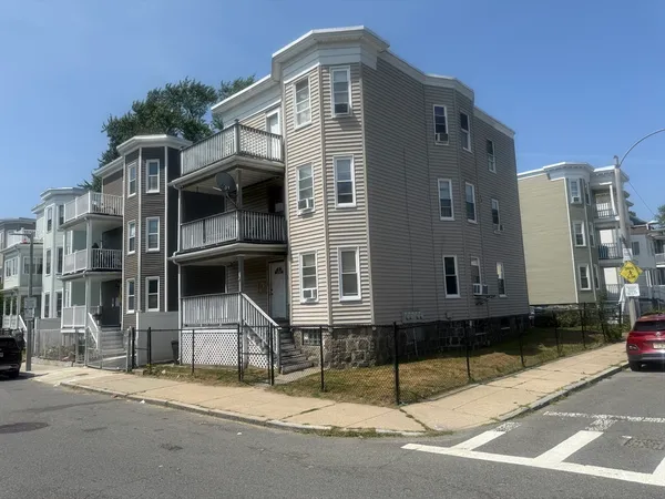 a front view of a house with street