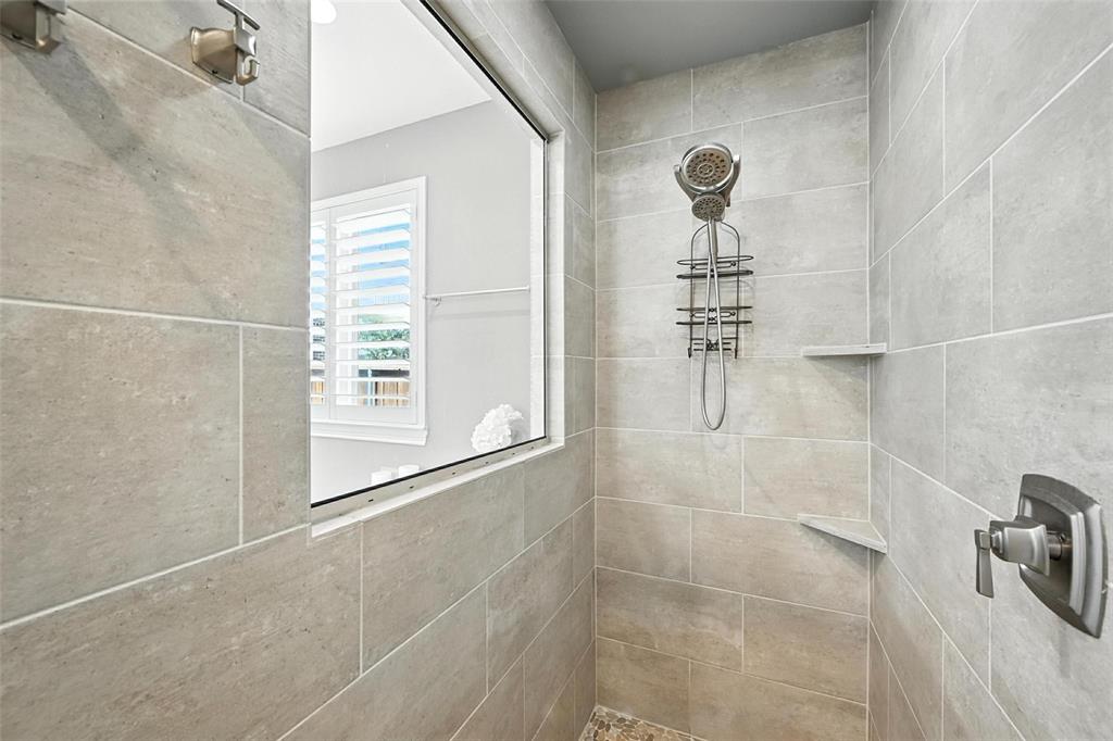 1909 Snapdragon Road Frisco, TX 75033 - Photo 21 of 40 a bathroom with a shower