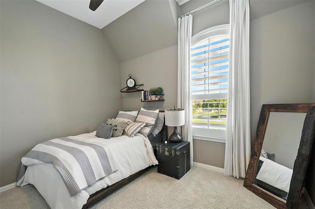 1909 Snapdragon Road Frisco, TX 75033 - Photo 22 of 40 a bedroom with a bed and a window