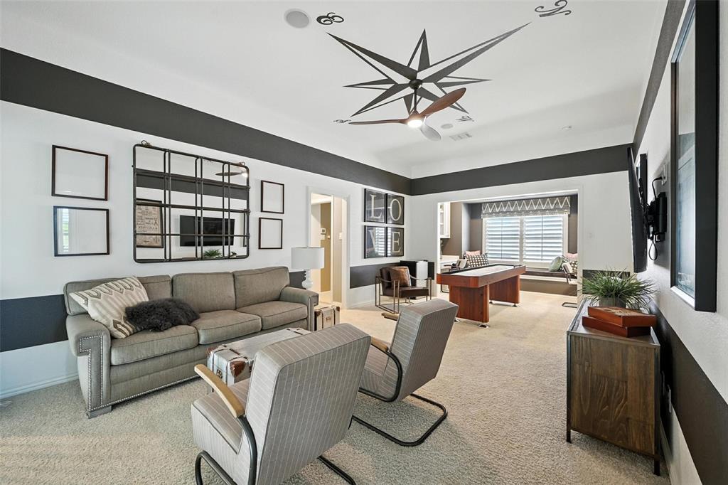 1909 Snapdragon Road Frisco, TX 75033 - Photo 33 of 40 a living room with furniture and a large window