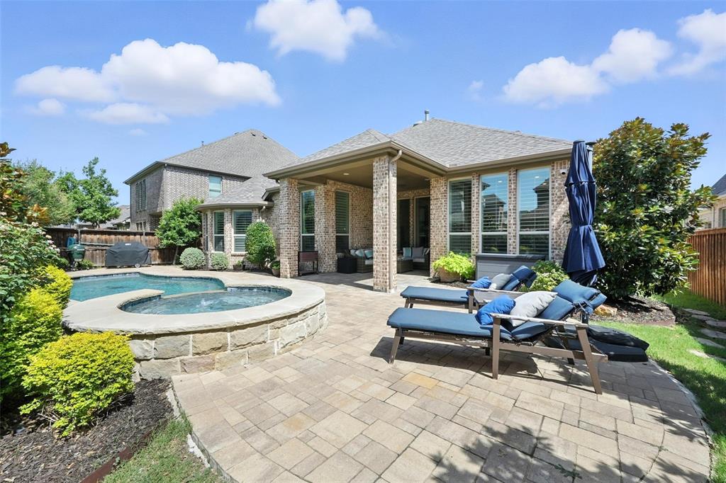1909 Snapdragon Road Frisco, TX 75033 - Photo 37 of 40 a building outdoor space with patio furniture and potted plants