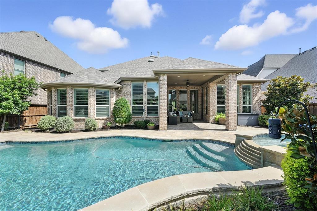 1909 Snapdragon Road Frisco, TX 75033 - Photo 38 of 40 a view of a house with yard and porch