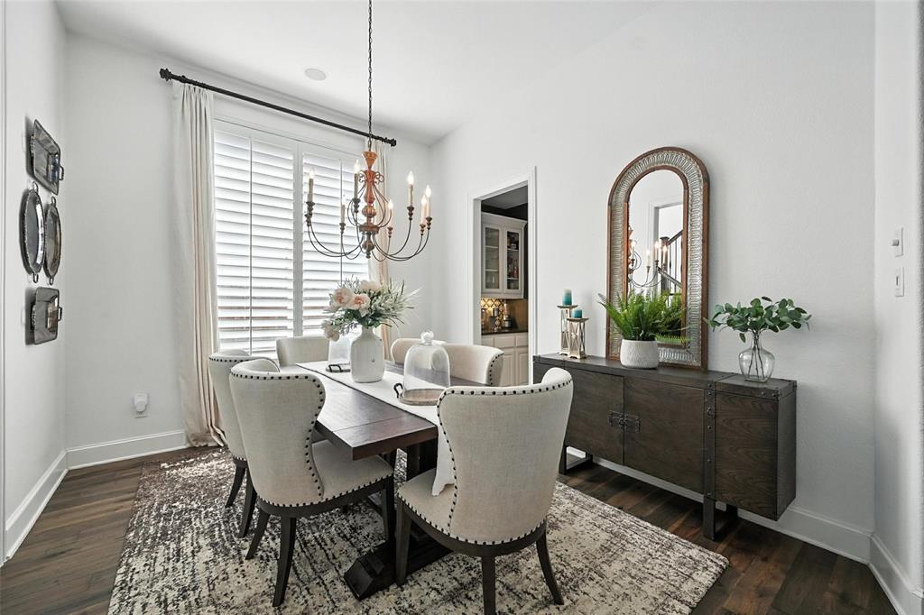 1909 Snapdragon Road Frisco, TX 75033 - Photo 5 of 40 a dining room with furniture window and wooden floor