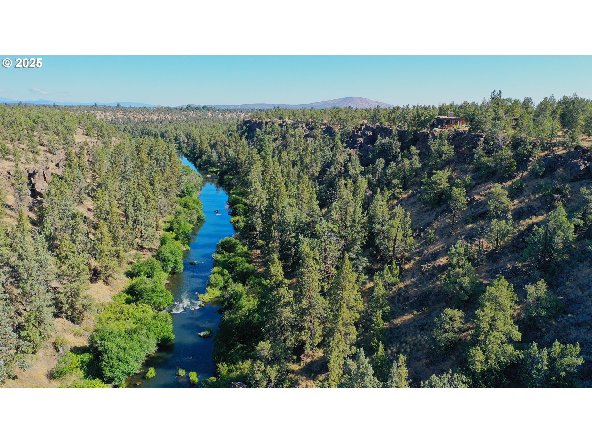65255 Swalley Road Bend, OR 97703 - Photo 1 of 48 a black and white photo of a room