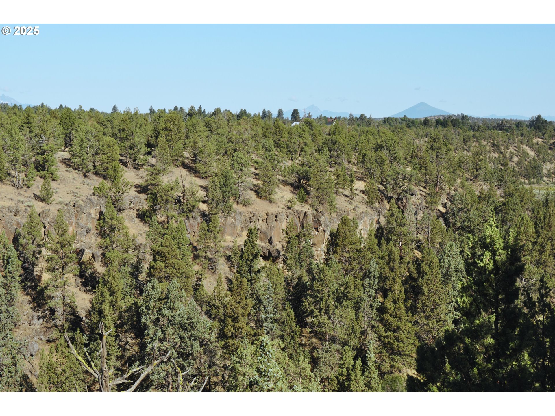 65255 Swalley Road Bend, OR 97703 - Photo 17 of 48 a view of a city and a mountain