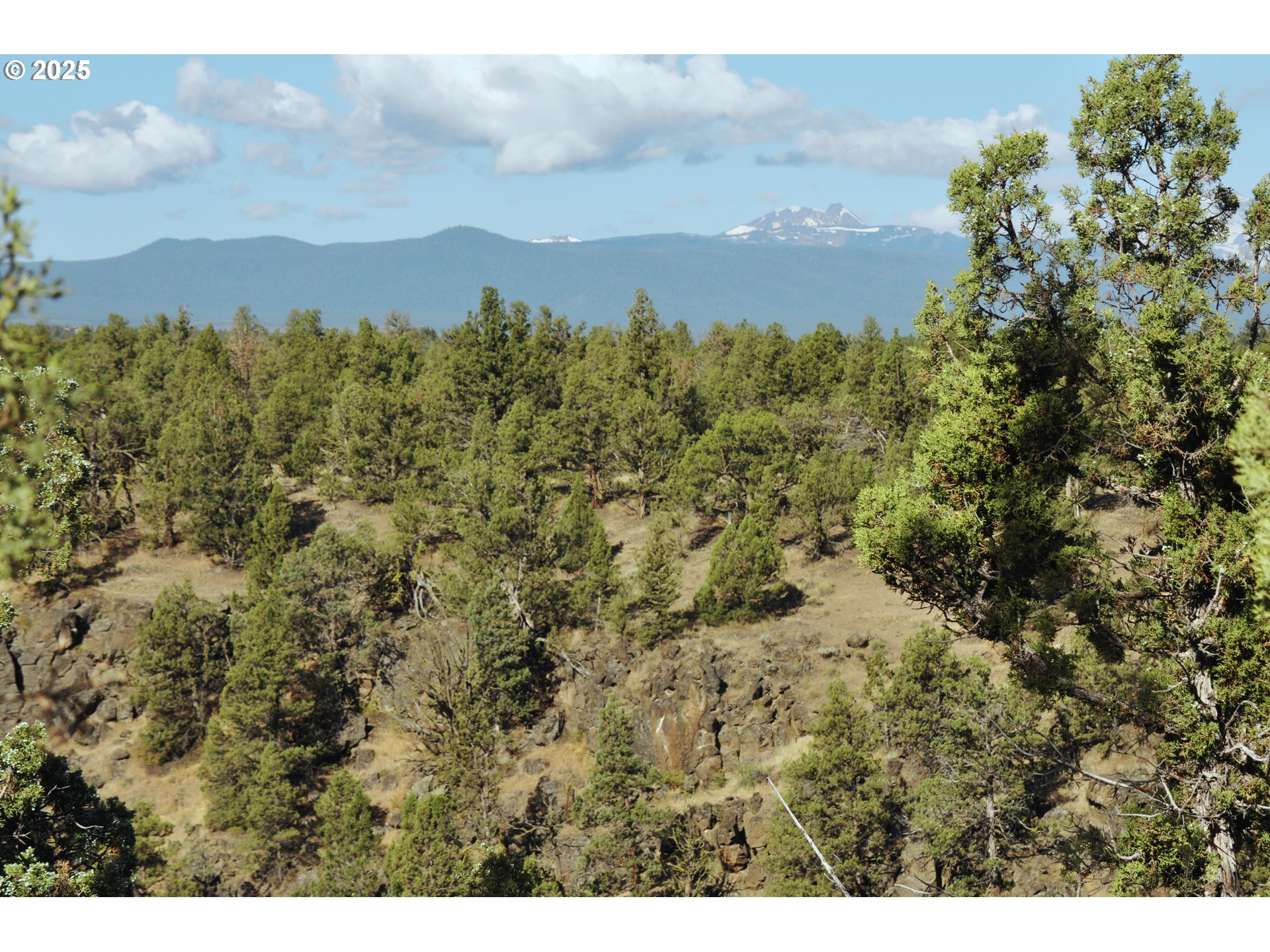 65255 Swalley Road Bend, OR 97703 - Photo 19 of 48 a view of a city with green space