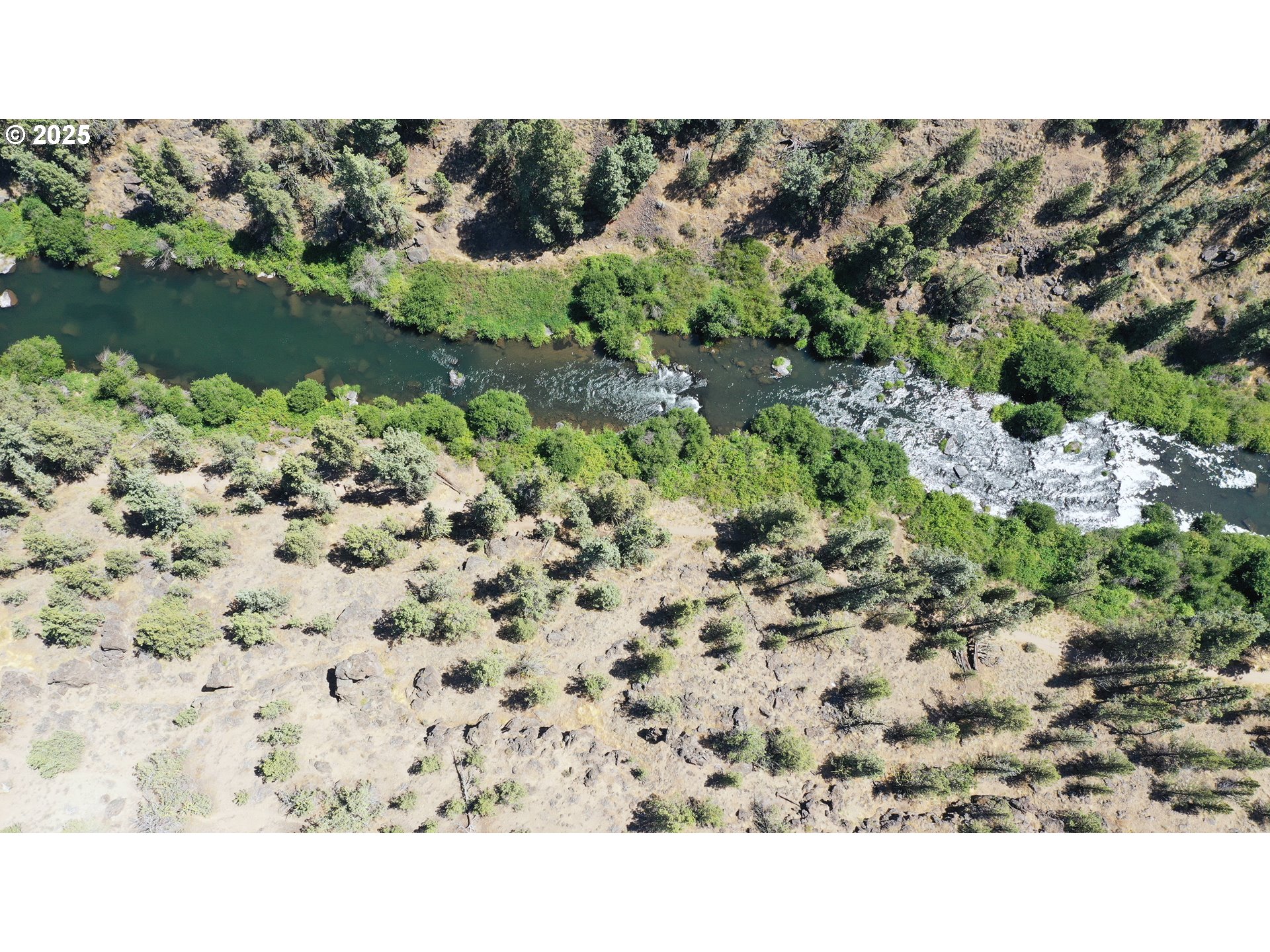 65255 Swalley Road Bend, OR 97703 - Photo 32 of 48 a black and white photo of a lake